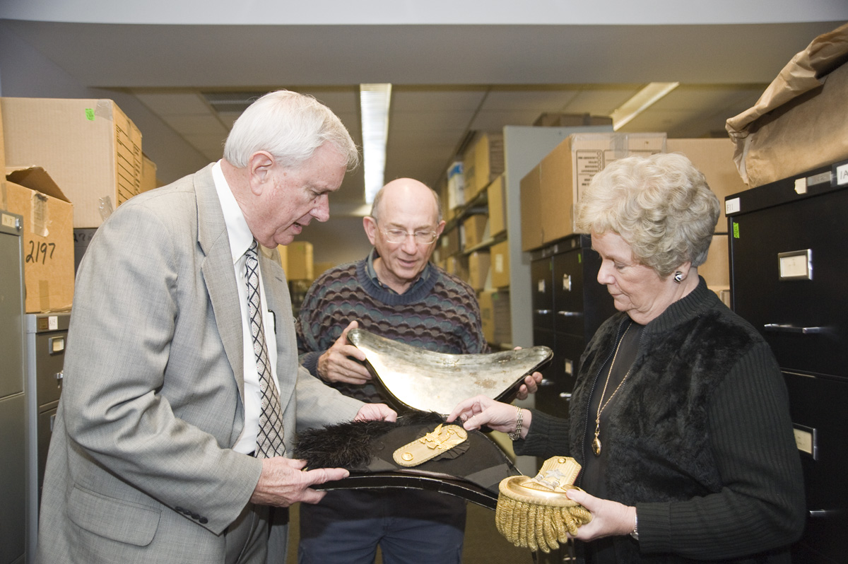Historian John Marszalek (c), interim Mississippi State President Roy Ruby and Frances Coleman, dean of university libraries, look over artifacts of the U.S. Grant Collection. Historian John Marszalek (c), interim Mississippi State President Roy Ruby and Frances Coleman, dean of university libraries, look over artifacts of the U.S. Grant Collection.