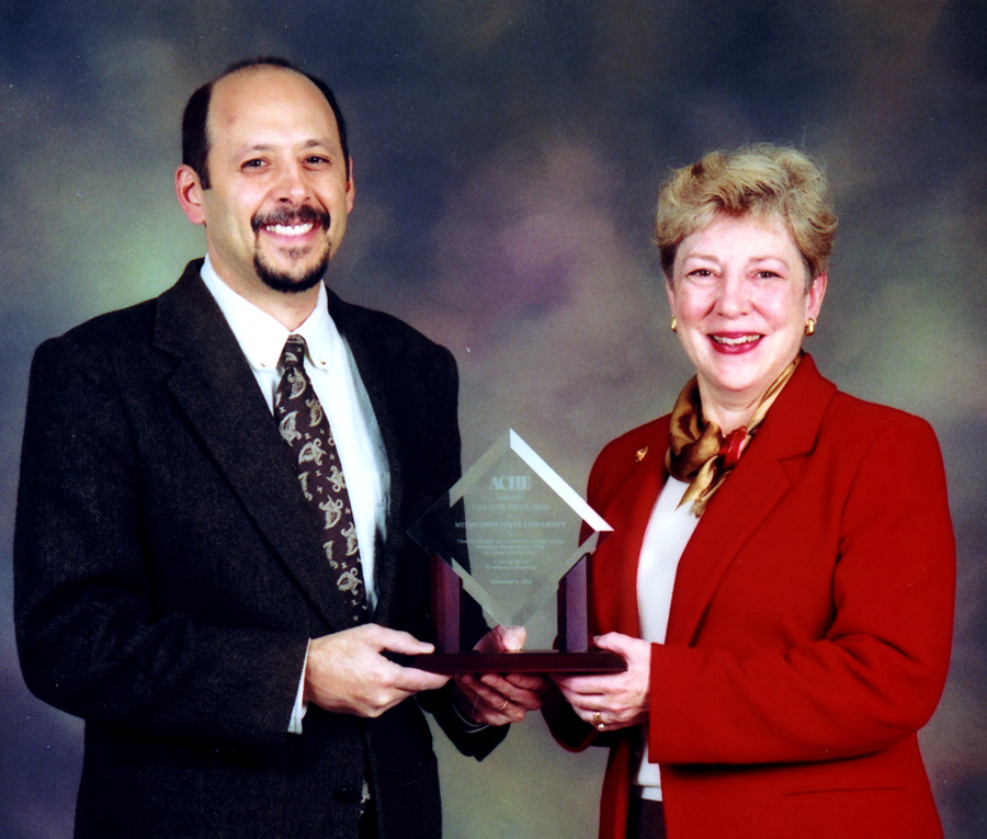 <br /><br />
MSU'S Phil Bonfanti and Fairfax Montgomery display the Crystal Marketing Award. <br /><br />
MSU'S Phil Bonfanti and Fairfax Montgomery display the Crystal Marketing Award.