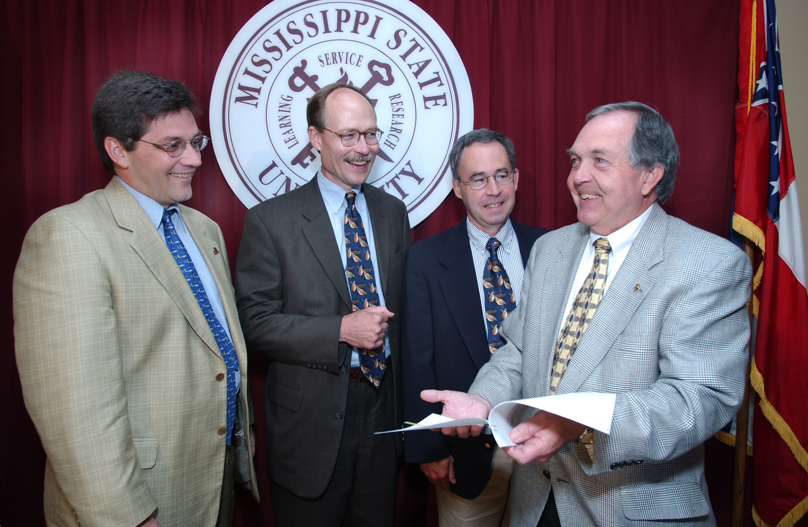 <br /><br />
Commemorating the partnership were (l-r) Bruce Knight of the Natural Resources Conservation Center, Corky Pugh of the Southeastern Association of Fish and Wildlife Agencies, Dave Howell of Quail Unlimited, and Vance Watson, MSU interim vice president of agriculture, forestry and veterinary medicine. <br /><br />
Commemorating the partnership were (l-r) Bruce Knight of the Natural Resources Conservation Center, Corky Pugh of the Southeastern Association of Fish and Wildlife Agencies, Dave Howell of Quail Unlimited, and Vance Watson, MSU interim vice president of agriculture, forestry and veterinary medicine.