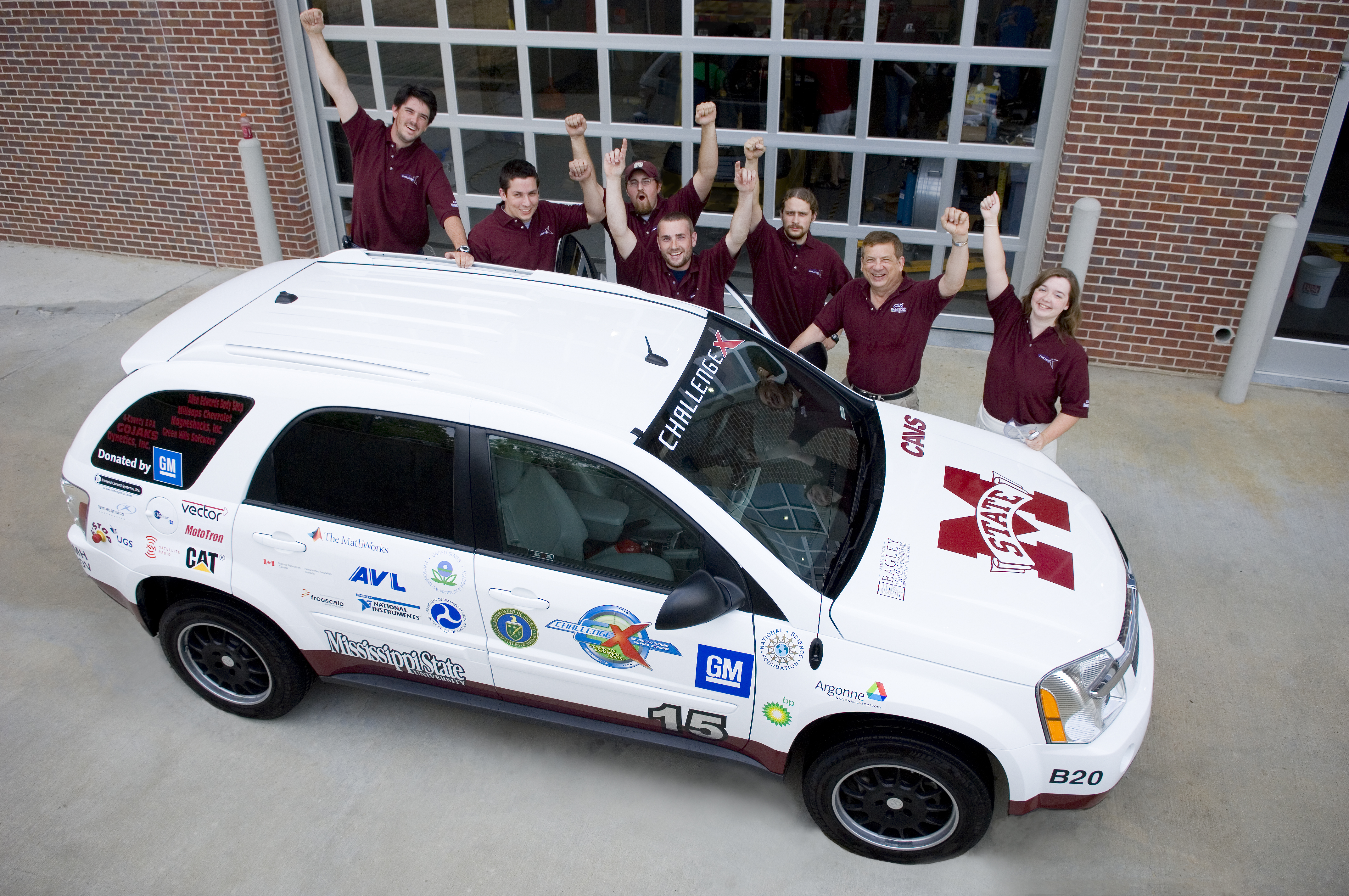 Mississippi State's Challenge X team gathered before the vehicle was loaded onto a truck to ship to Michigan. MSU students have designed the vehicle to be more fuel efficient and environmentally friendly. The team will begin on May 30 a nine-day competition with 16 other university teams with similar vehicles. In 2006, MSU won third place overall, winning first in many subcategories. Mississippi State's Challenge X team gathered before the vehicle was loaded onto a truck to ship to Michigan. MSU students have designed the vehicle to be more fuel efficient and environmentally friendly. The team will begin on May 30 a nine-day competition with 16 other university teams with similar vehicles. In 2006, MSU won third place overall, winning first in many subcategories.
