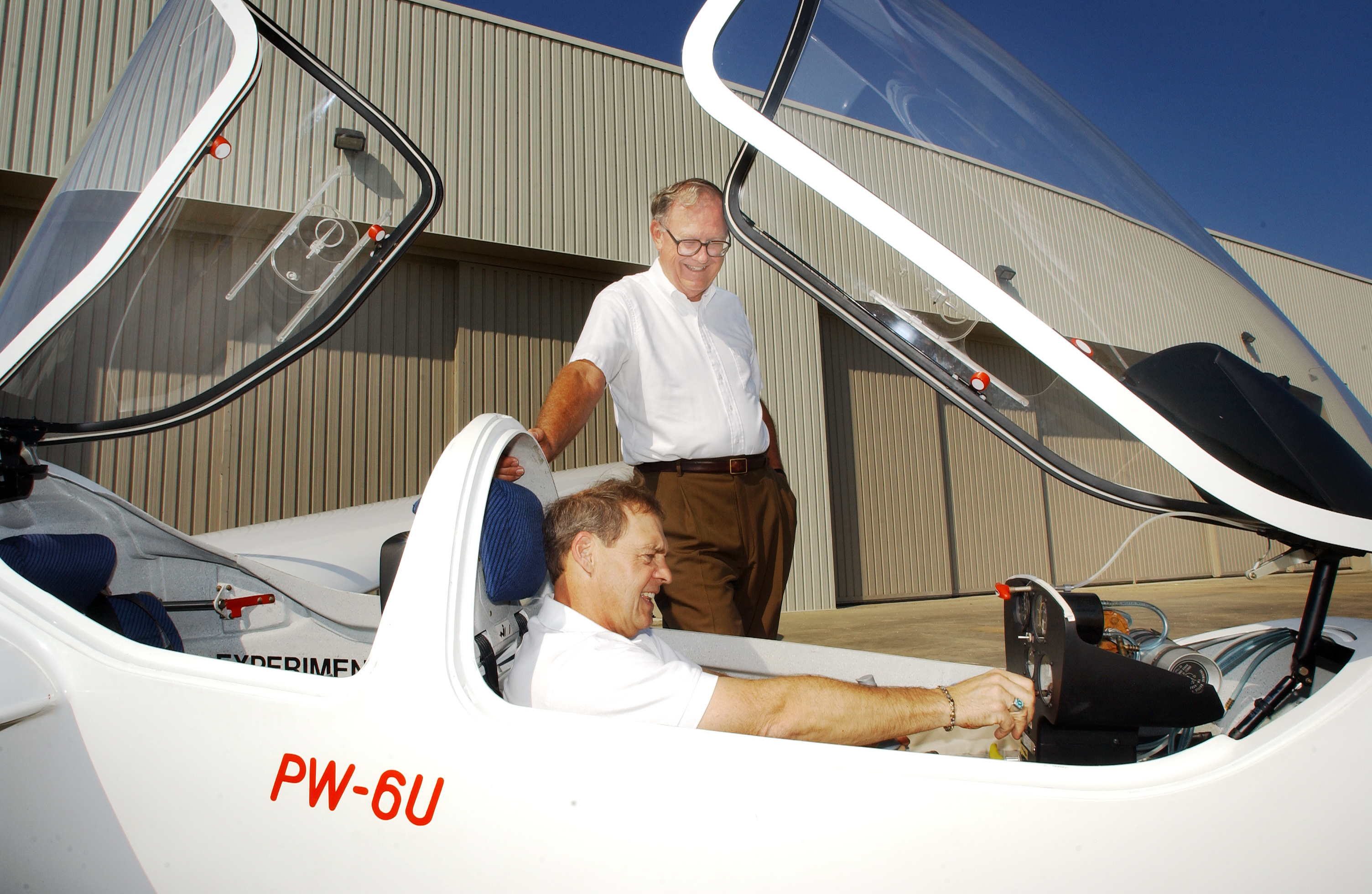 <br />
MSU's Raspet Flight Lab director David Lawrence (seated) with former director George Bennett. 