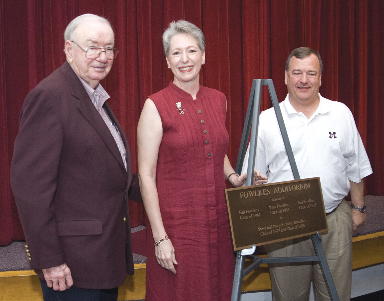 Mississippi State alumni (l-r) Bill Fowlkes, daughter Patsy Fowlkes Brandon and son-in-law Steve Brandon at recent university naming ceremony. Mississippi State alumni (l-r) Bill Fowlkes, daughter Patsy Fowlkes Brandon and son-in-law Steve Brandon at recent university naming ceremony.