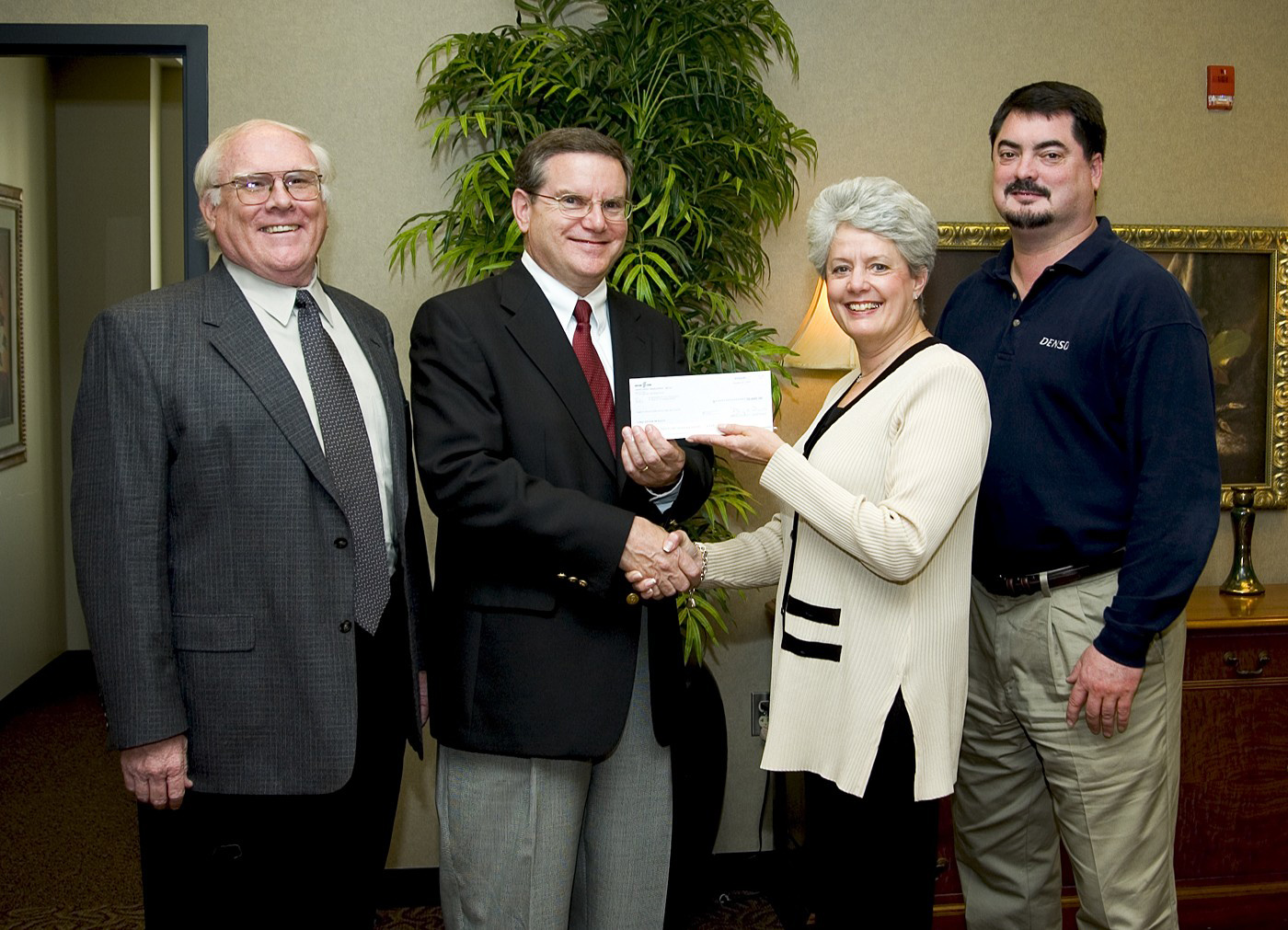 <br /><br />
Barbara Wertheimer, secretary and program officer for DENSO North America Foundation, presents a $30,000 check to Glenn Steele, interim dean of Mississippi State's Bagley College of Engineering. The gift will fund the purchase of a Pro 800 dynamometer that MSU engineering students will use in designing and building a small formula-style racing car for international competition next year. Also participating in the presentation ceremony were Keith Hodge (l), interim head of MSU's mechanical engineering department and Russell Bearden, supervisor of staffing for DENSO Manufacturing Tennessee at Maryville, Tenn.<br /><br />
<br /><br />
Barbara Wertheimer, secretary and program officer for DENSO North America Foundation, presents a $30,000 check to Glenn Steele, interim dean of Mississippi State's Bagley College of Engineering. The gift will fund the purchase of a Pro 800 dynamometer that MSU engineering students will use in designing and building a small formula-style racing car for international competition next year. Also participating in the presentation ceremony were Keith Hodge (l), interim head of MSU's mechanical engineering department and Russell Bearden, supervisor of staffing for DENSO Manufacturing Tennessee at Maryville, Tenn.<br /><br />