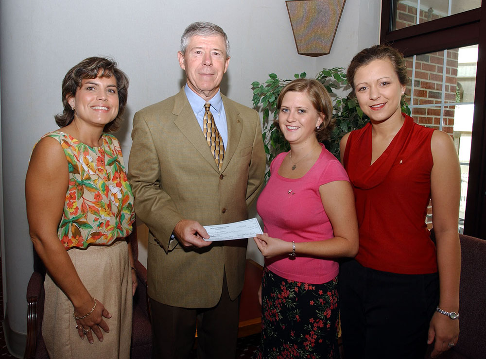 <br /><br />
MSU Delta Gamma treasurer Sarah Crain of Holly Springs (second from right) and vice president Kathryn Adamson of Birmingham, Ala., (right) present a Martin Lectureship endowment check to MSU Foundation officers Trish Hughes and Richard Armstrong. Hughes is director of special giving Armstrong, executive director. <br /><br />
MSU Delta Gamma treasurer Sarah Crain of Holly Springs (second from right) and vice president Kathryn Adamson of Birmingham, Ala., (right) present a Martin Lectureship endowment check to MSU Foundation officers Trish Hughes and Richard Armstrong. Hughes is director of special giving Armstrong, executive director.