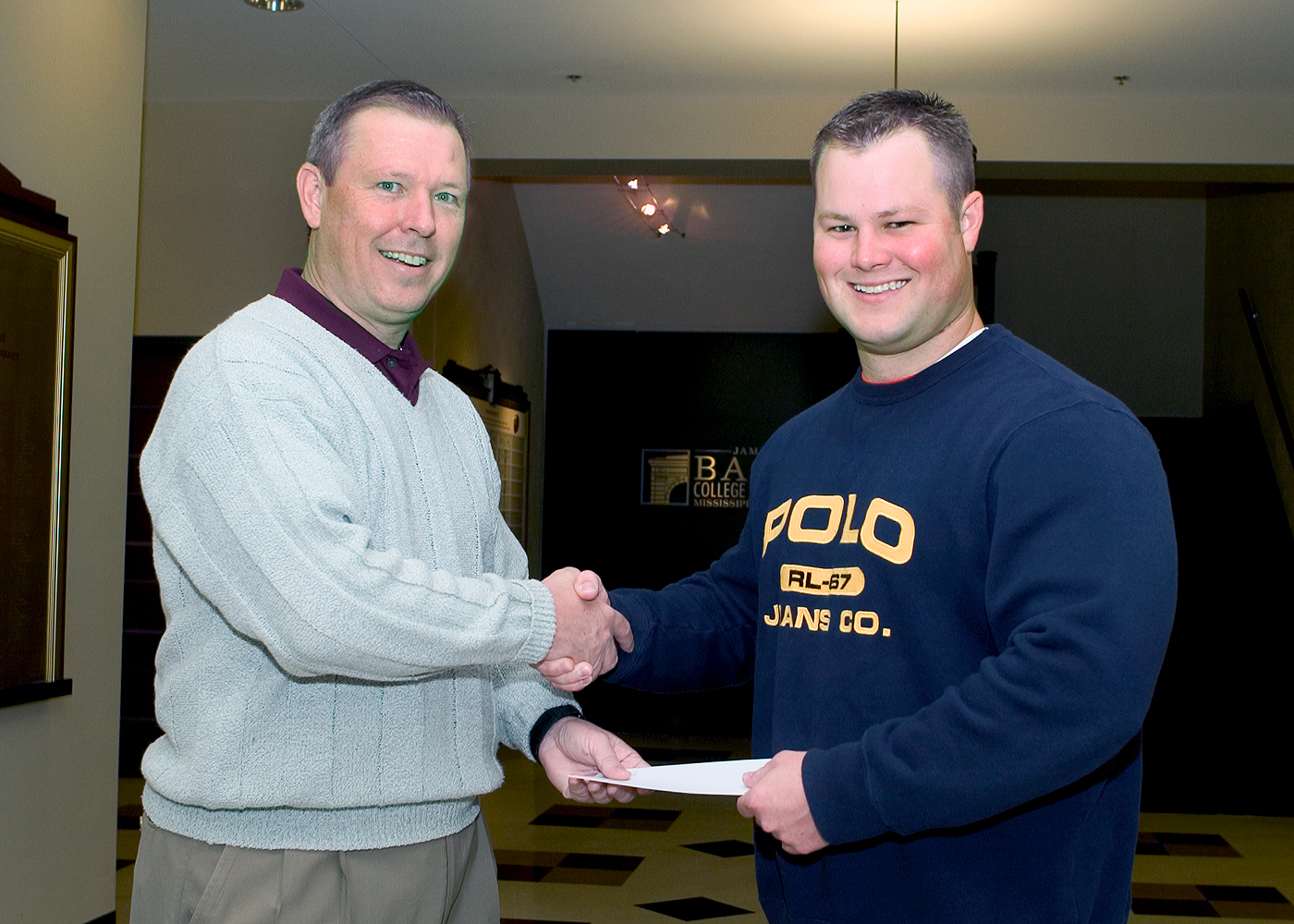 <br /><br />
Student entrepreneur Dustin Bailey (r) is congratulated by MSU's Gerald Nelson. <br /><br />
Student entrepreneur Dustin Bailey (r) is congratulated by MSU's Gerald Nelson.