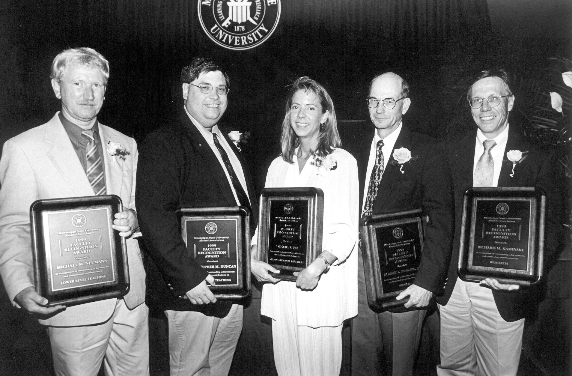 <br /><br />
Receiving 1999 Mississippi State University Alumni Association Faculty Achievement Awards are (l-r) Michael M. Neumann, Christopher M. Duncan, Virginia Fee, Robert L. Phillips Jr., and Richard M. Kaminski.</p><br />
<p> <br /><br />
Receiving 1999 Mississippi State University Alumni Association Faculty Achievement Awards are (l-r) Michael M. Neumann, Christopher M. Duncan, Virginia Fee, Robert L. Phillips Jr., and Richard M. Kaminski.</p><br />
<p>