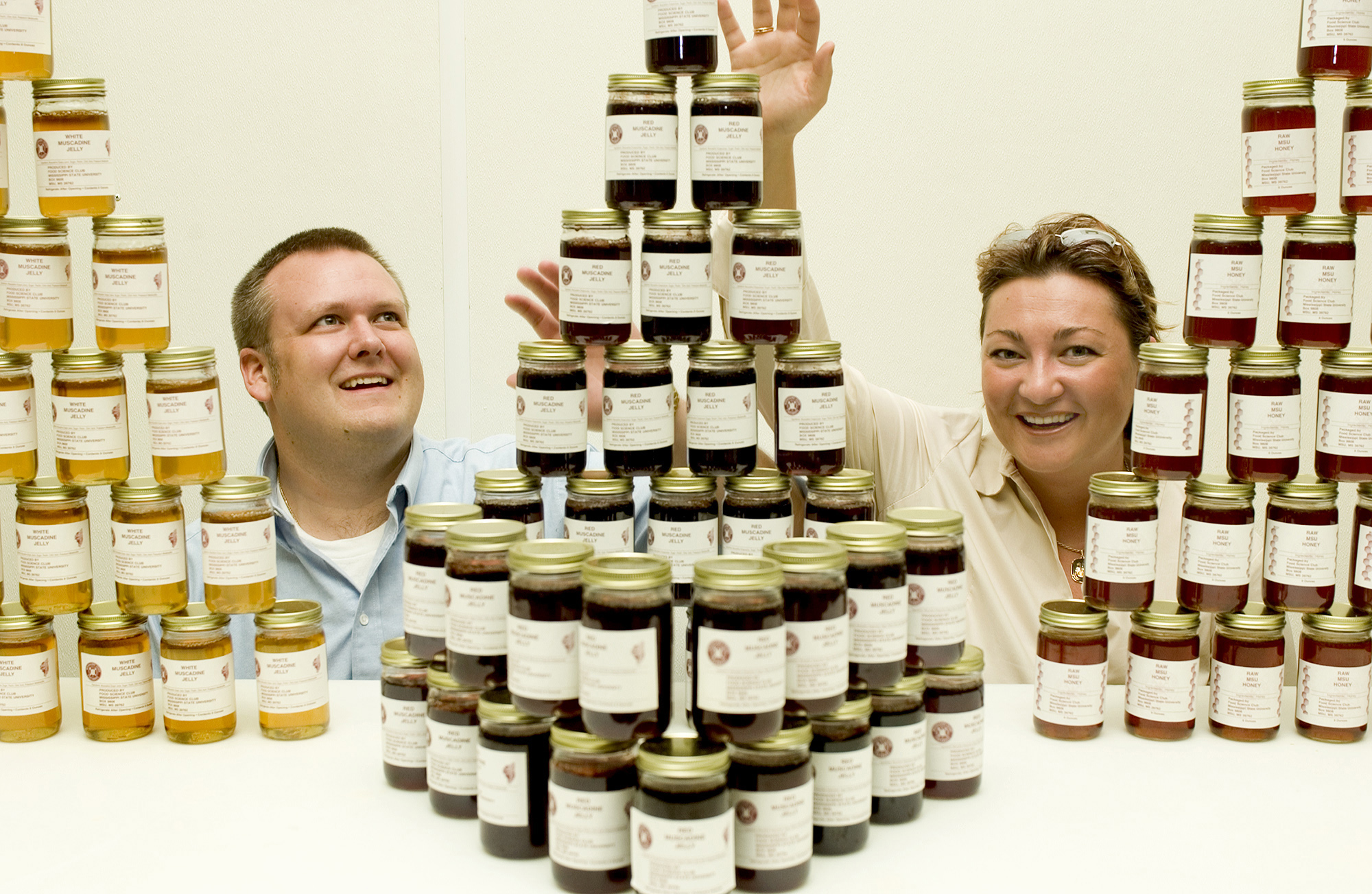 <br /><br />
MSU Food Science Club officers Neil Bogart and Jelena Stojanovic with some of the jellies, jams and honey members produce annually. <br /><br />
MSU Food Science Club officers Neil Bogart and Jelena Stojanovic with some of the jellies, jams and honey members produce annually.