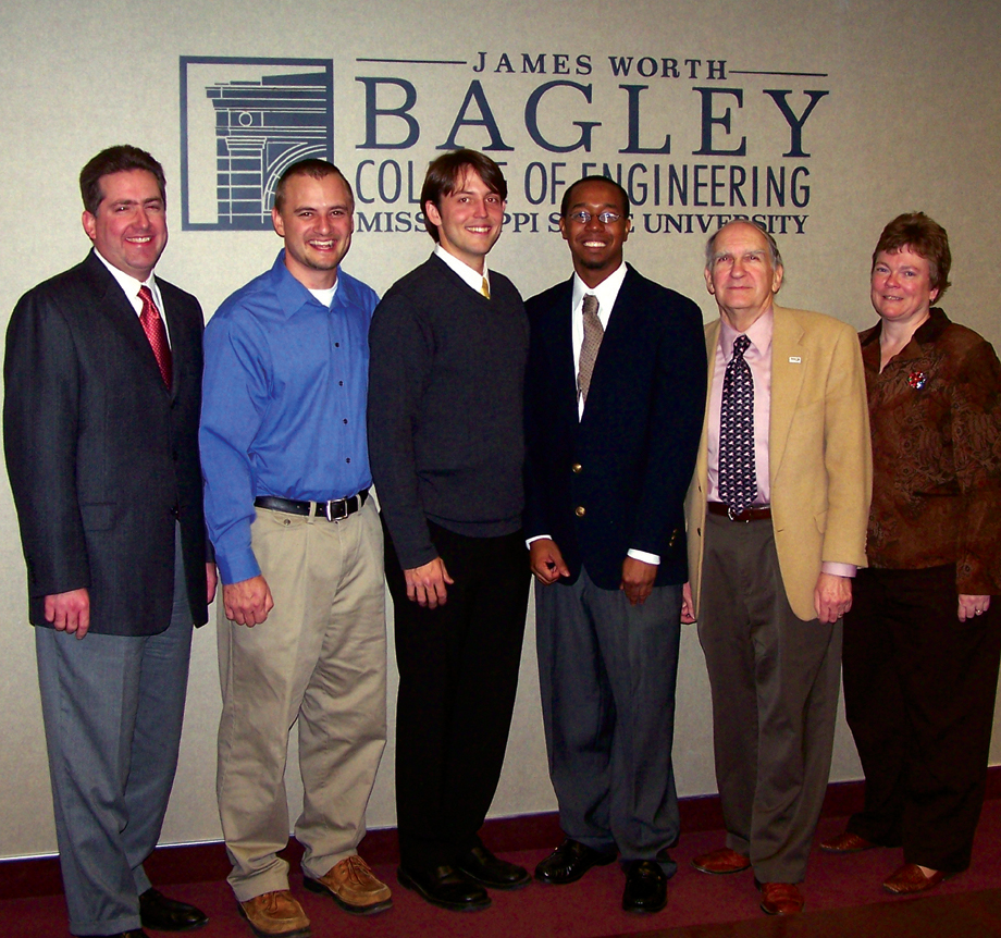 Mississippi State students Justin R. Jackson of Biloxi and Johnny Sanders of Vicksburg (third and fourth from the left) are 2005 recipients of Materials Certificates in the Bagley College of Engineering. Another Vicksburg native, Dustin H. McKnight (not pictured), also received the certificate along with the other recipients prior to MSU's fall commencement ceremonies. All three are graduate students in mechanical engineering. The Materials Certificate program recognizes students who complete an organized plan of study in the interdisciplinary materials engineering and science areas at MSU. Also pictured (from the left) are engineering Dean Kirk H. Schulz, associate professor of forest products Rubin Shmulsky, mechanical engineering professor John T. Berry and college Associate Dean Donna S. Reese. Mississippi State students Justin R. Jackson of Biloxi and Johnny Sanders of Vicksburg (third and fourth from the left) are 2005 recipients of Materials Certificates in the Bagley College of Engineering. Another Vicksburg native, Dustin H. McKnight (not pictured), also received the certificate along with the other recipients prior to MSU's fall commencement ceremonies. All three are graduate students in mechanical engineering. The Materials Certificate program recognizes students who complete an organized plan of study in the interdisciplinary materials engineering and science areas at MSU. Also pictured (from the left) are engineering Dean Kirk H. Schulz, associate professor of forest products Rubin Shmulsky, mechanical engineering professor John T. Berry and college Associate Dean Donna S. Reese.