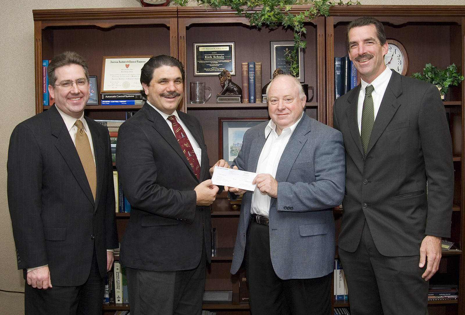Participating in the $50,000 check presentation ceremony were (l-r) Mississippi State Dean of Engineering Kirk H. Schulz; MSU aerospace engineering professor and department head Tony Vizzini; Allen Lockyer, manager of Advanced Structures Development, Integrated Systems, Western Region, for Northrop Grumman; and Northrop Grumman's Tod Palm, Integrated Product Team Leader, Integrated Systems, Western Region. Participating in the $50,000 check presentation ceremony were (l-r) Mississippi State Dean of Engineering Kirk H. Schulz; MSU aerospace engineering professor and department head Tony Vizzini; Allen Lockyer, manager of Advanced Structures Development, Integrated Systems, Western Region, for Northrop Grumman; and Northrop Grumman's Tod Palm, Integrated Product Team Leader, Integrated Systems, Western Region.