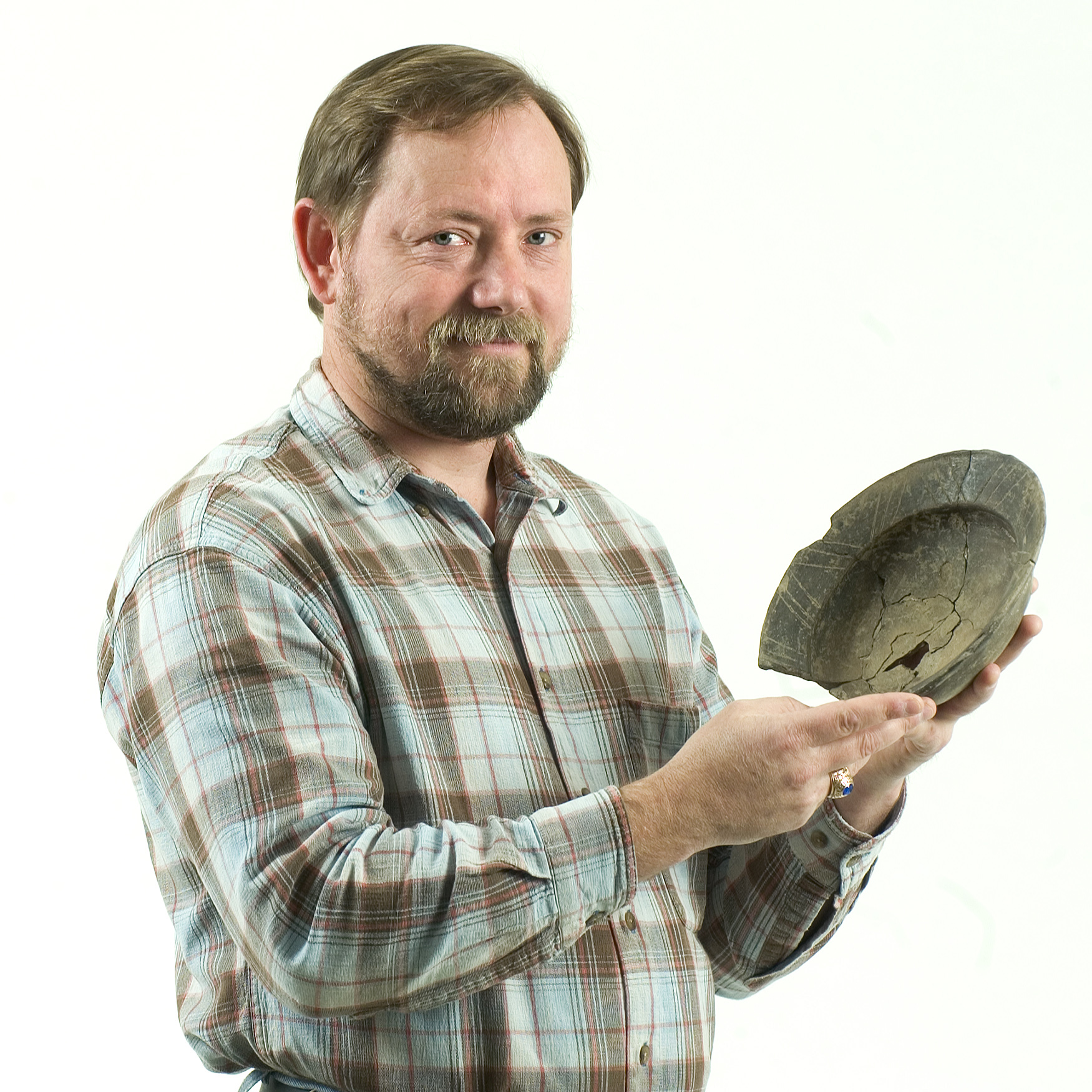 MSU associate professor of anthropology Evan Peacock displays a piece of Native American pottery, about 400-500 years old, that was unearthed from the Lyon's Bluff historic site near Starkville. The university's new "atomic paring knife" will enhance his archaeological research efforts. MSU associate professor of anthropology Evan Peacock displays a piece of Native American pottery, about 400-500 years old, that was unearthed from the Lyon's Bluff historic site near Starkville. The university's new "atomic paring knife" will enhance his archaeological research efforts.
