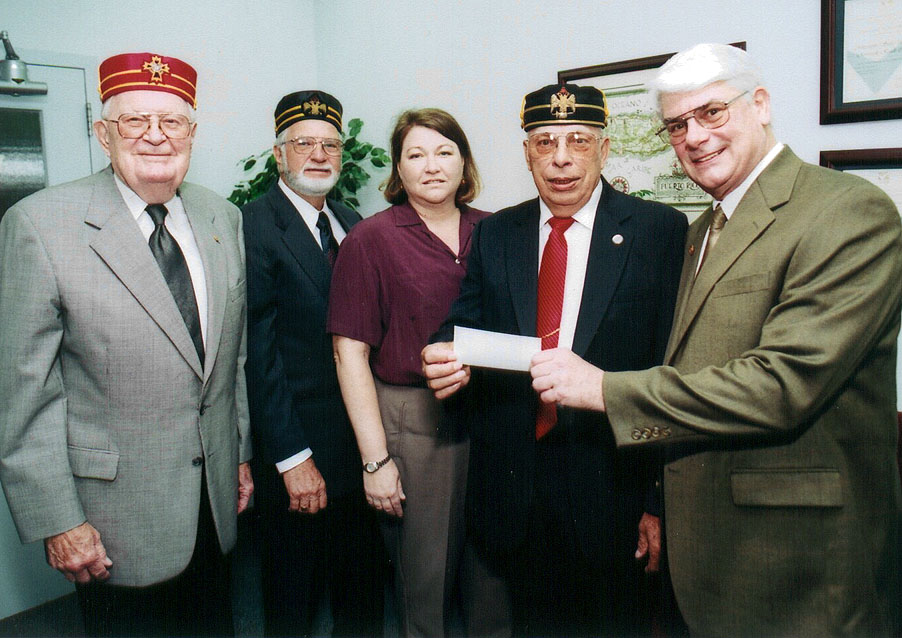 <br /><br />
Lowndes Scottish Rite Association officers recently established a scholarship fund at MSU. Association officers (from left) Charles Waldron, Ed Humphries and Wilbur Hartle (second from right) made the presentation to Carlen Henington and Thomas Hosie. <br /><br />
Lowndes Scottish Rite Association officers recently established a scholarship fund at MSU. Association officers (from left) Charles Waldron, Ed Humphries and Wilbur Hartle (second from right) made the presentation to Carlen Henington and Thomas Hosie.