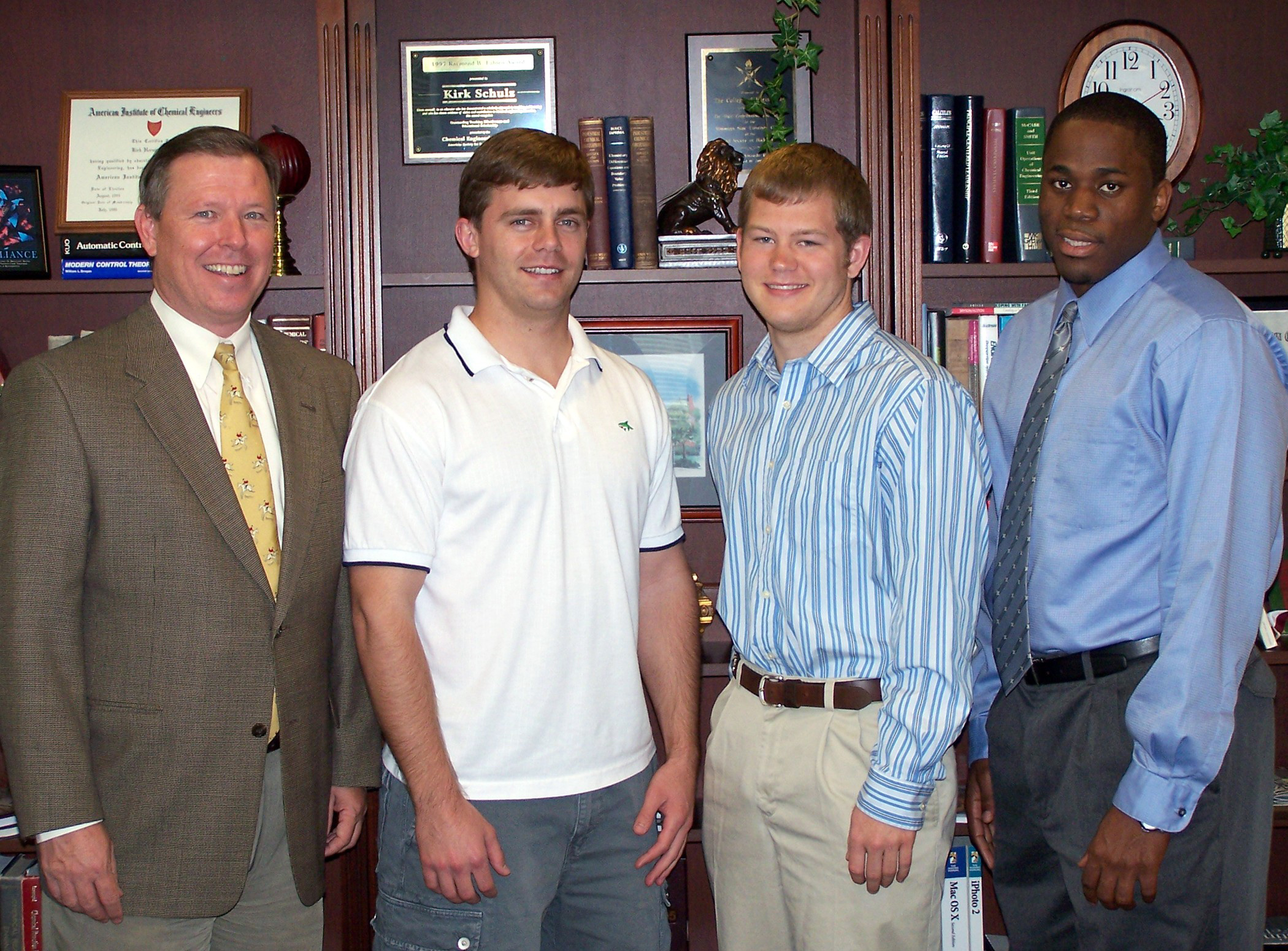 Gerald Nelson, from left, director of entrepreneurship for the Bagley College of Engineering, recognizes 2005 Jack Hatcher business plan competition student winners Harold S. "Tommy" Thompson III of Decatur, Ala., Jeremy Wolfe of Vicksburg and Byron Williams of Jackson. Other winners not present were students Kyle Miller of Moss Point and Blake Webster of Florence. Gerald Nelson, from left, director of entrepreneurship for the Bagley College of Engineering, recognizes 2005 Jack Hatcher business plan competition student winners Harold S. "Tommy" Thompson III of Decatur, Ala., Jeremy Wolfe of Vicksburg and Byron Williams of Jackson. Other winners not present were students Kyle Miller of Moss Point and Blake Webster of Florence.