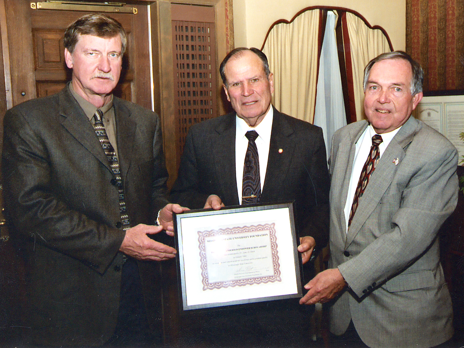 <br /><br />
Cleveland agribusinessman James Smith (l) with retired MSU administrator Kelton Anderson (c) and Vance Watson, the university's vice president for agriculture, forestry and veterinary medicine. <br /><br />
Cleveland agribusinessman James Smith (l) with retired MSU administrator Kelton Anderson (c) and Vance Watson, the university's vice president for agriculture, forestry and veterinary medicine.
