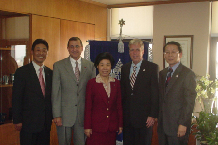 External affairs and development Dean H. K. Kim (left) and President Kyungsook Lee of South Korea's Sookmyung Women's University welcomed MSU Alumni Association executive director Jimmy Abraham (second from left), President Robert H. "Doc" Foglesong and MSU business professor J.P. Shim (right). External affairs and development Dean H. K. Kim (left) and President Kyungsook Lee of South Korea's Sookmyung Women's University welcomed MSU Alumni Association executive director Jimmy Abraham (second from left), President Robert H. "Doc" Foglesong and MSU business professor J.P. Shim (right).