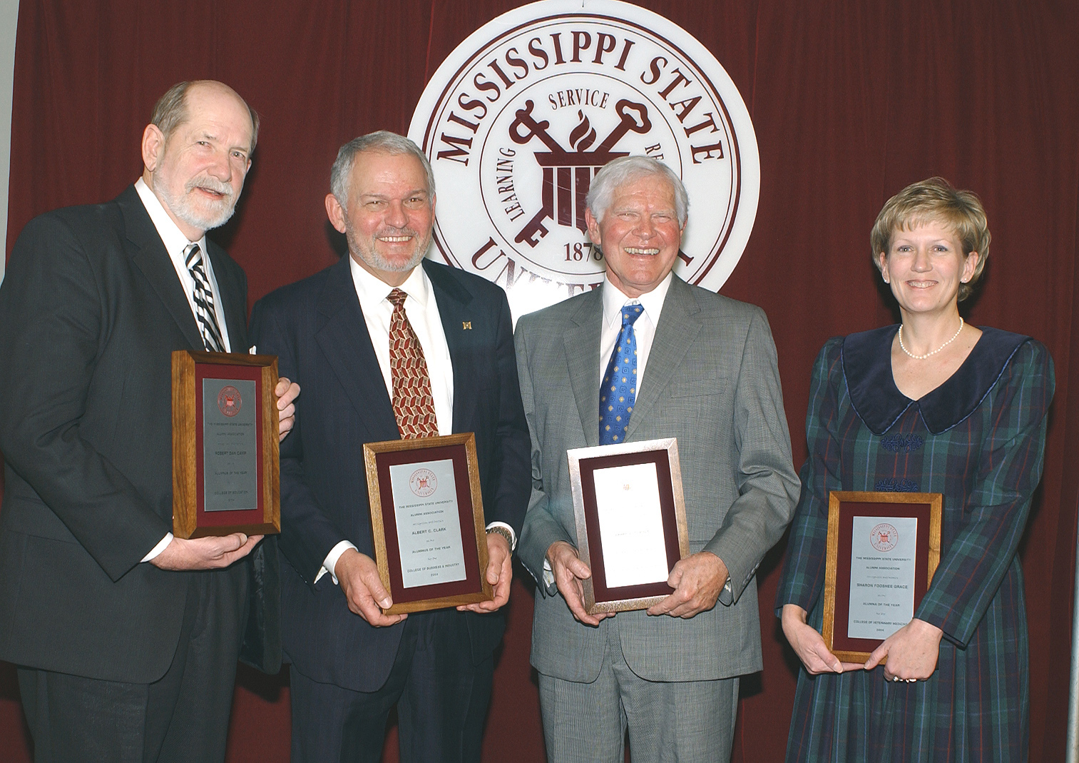 <br /><br />
Robert D. "Dan" Camp, Albert C. Clark, J.L. "Jim" Tisdale, and Sharon F. Grace <br /><br />
Robert D. "Dan" Camp, Albert C. Clark, J.L. "Jim" Tisdale, and Sharon F. Grace
