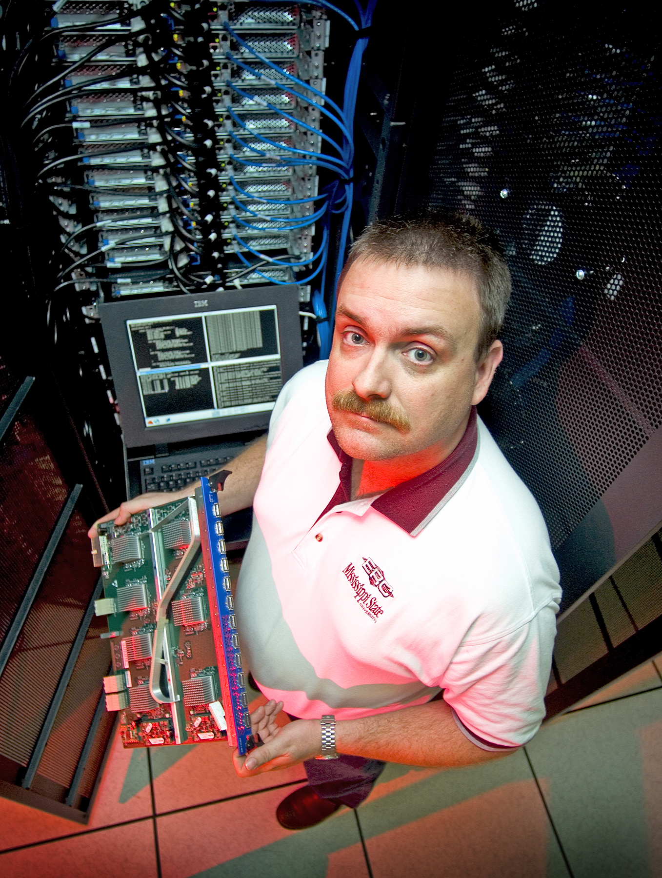 <br /><br />
Roger Smith, surrounded by MSU's Maverick supercomputer<br /><br />
<br /><br />
Roger Smith, surrounded by MSU's Maverick supercomputer<br /><br />