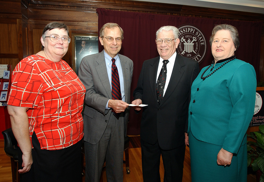 <br /><br />
Census data recently provided to MSU by Starkville residents E.O. and Betty Templeton (r) were accepted by reference librarian Lynne Mueller and associate provost George Rent. <br /><br />
Census data recently provided to MSU by Starkville residents E.O. and Betty Templeton (r) were accepted by reference librarian Lynne Mueller and associate provost George Rent.